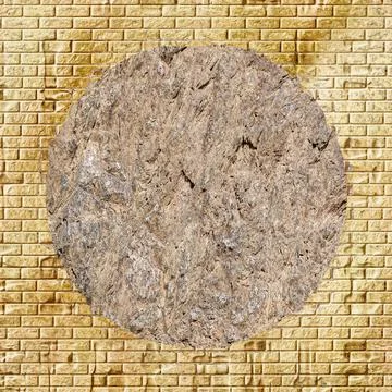 Brown rustic stone surface in a gold brick frame. Stock Photos