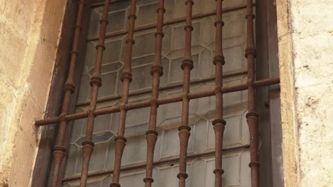Brown rusty patterned security grille (lattice) of a building window close-up Stock Footage 201861224