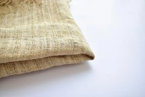 Brown sackcloth texture background, folded burlap fabric textile for design Fotos Stock