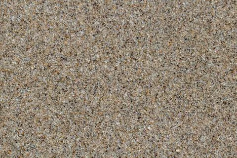 Brown, sand background texture, closeup, clean beach Stock Photos