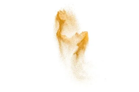 Brown sand explosion isolated on white background. Abstract sand cloud back.. Stock Photos