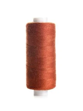 Brown sewing thread on white background Stock Photos