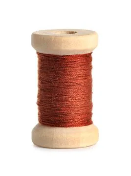 Brown sewing thread on white background Stock Photos