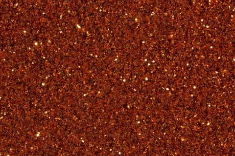 Brown shallow glitter on background. Stock Photos