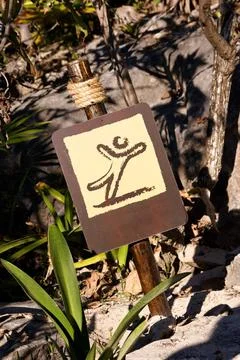 Brown Sign with Pictogram of a Falling Man Caution Slippery Sign with a Fa... Stock Photos