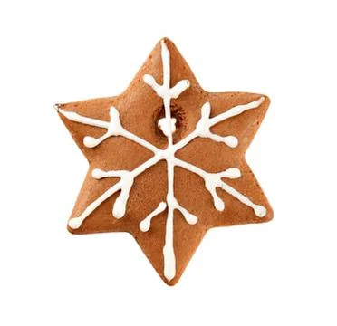 Brown star-shaped gingerbread cookie with snowflake design Stock Photos