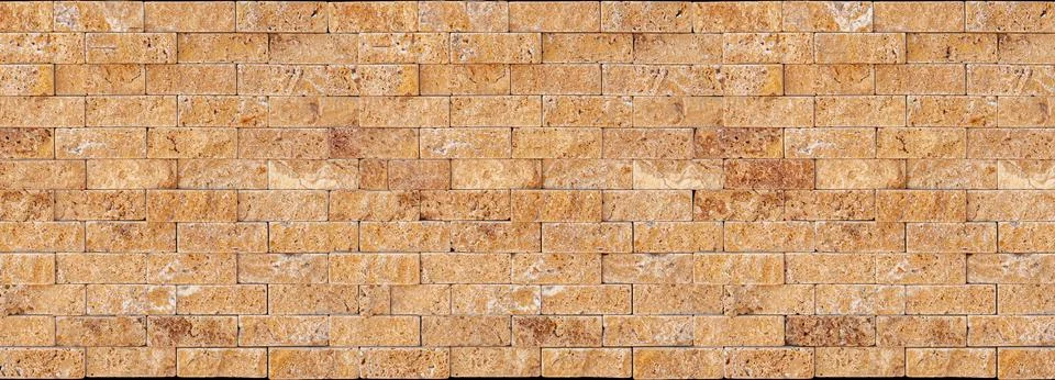 Brown stone brick wall texture background pattern Stockfoto's