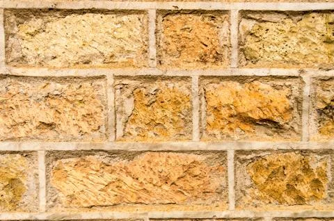 Brown stone wall background Stock Photos