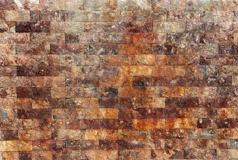Brown stone wall background Stock Photos