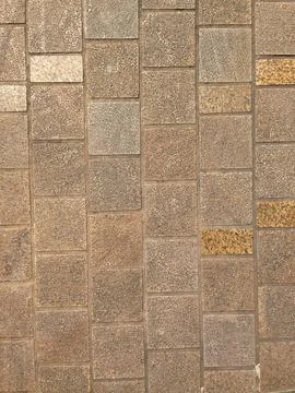 Brown Stone Wall with Rough Texture Stock Photos
