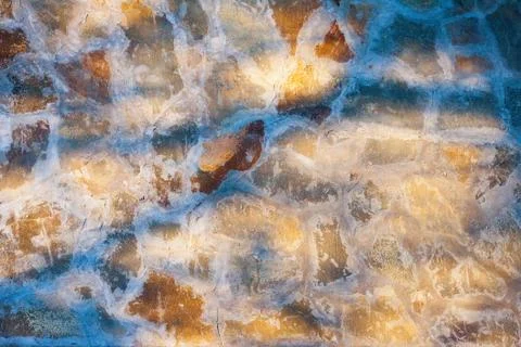 Brown stone wall with shadow Stock Photos