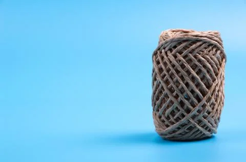 Brown string on blue background Stock Photos