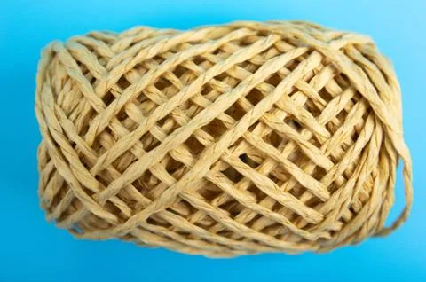 Brown string on blue background Stock Photos