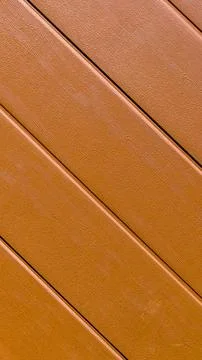 Brown striped plastic panels. texture or background Stock Photos
