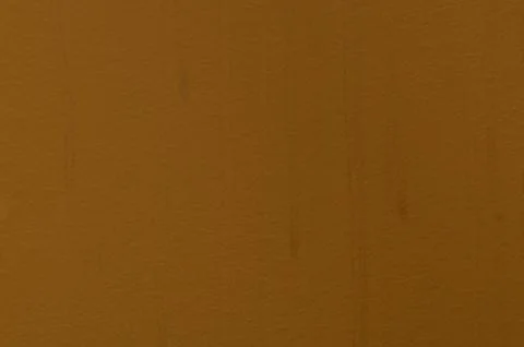 Brown structural painted wallpaper on the wall Stock Photos