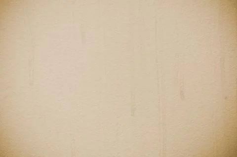 Brown structural painted wallpaper on the wall Stock Photos