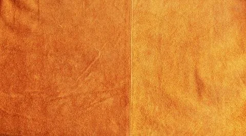 Brown suede closeup background. The texture of soft natural suede of the hi.. Stock Photos
