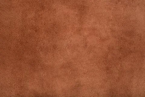 Brown suede leather texture background, genuine leather, top view. Stock Photos