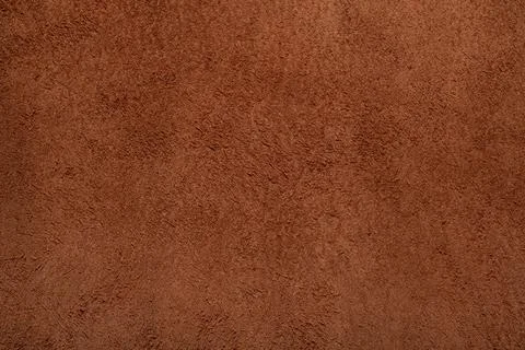 Brown suede leather texture background, genuine leather, top view. Stock Photos