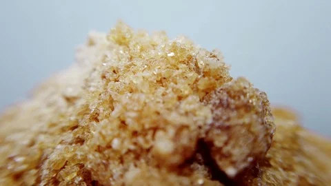 Brown sugar in closeup, looping 360 macro video Stock Footage 125678596