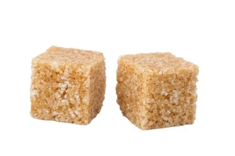 Brown sugar cubes isolated Stock Photos