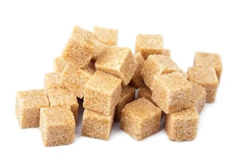 Brown sugar cubes isolated Stock Photos