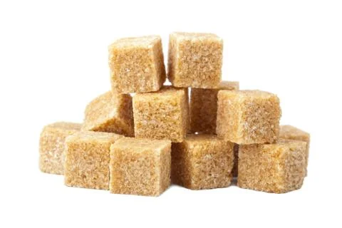 Brown sugar cubes isolated Stock Photos