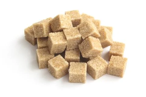 Brown sugar cubes Stock Photos