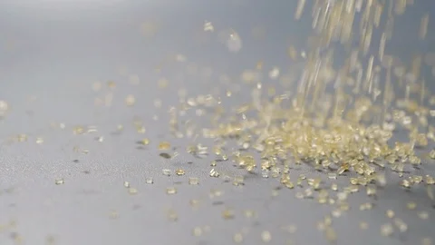 Brown sugar falling in slow motion, close-up Stock Footage 115142873
