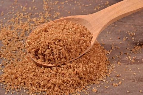 Brown sugar in a spoon Foto stock