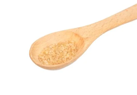 Brown sugar in spoon Stock Photos