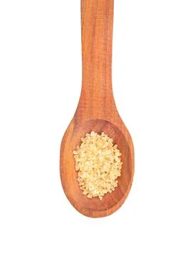 Brown sugar in spoon Stock Photos