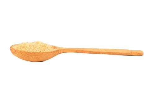 Brown sugar in spoon Stock-Fotos