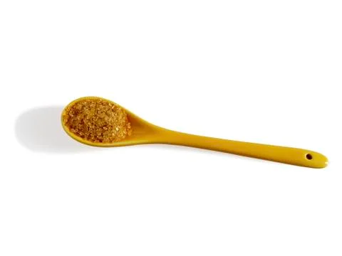 Brown sugar in tea spoon Stock Photos