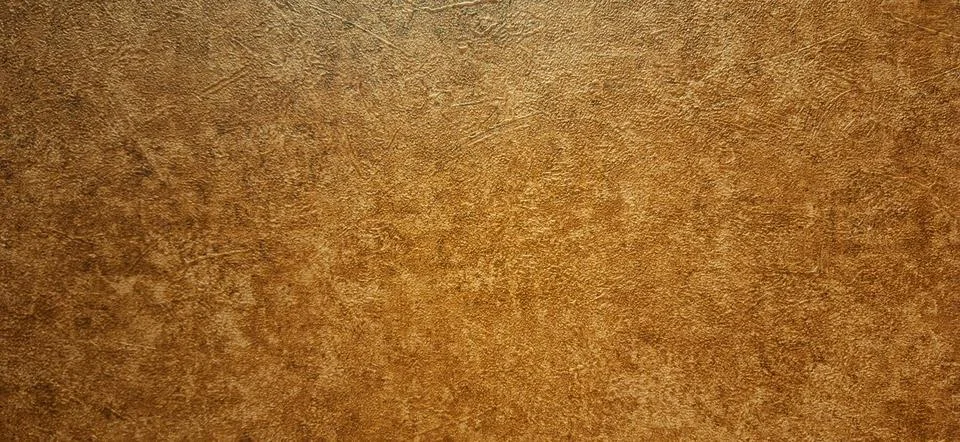 The brown surface has an old pattern. Stock Photos