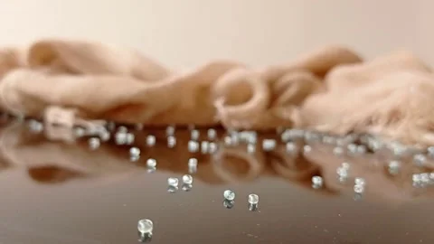 A brown table with pearls  Stock Footage 146257374