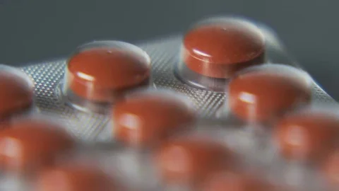 Brown tablets. Different focus Stock Footage 69215717