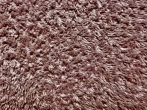 Brown terrycloth texture macro, view with fluffy looped fibers evoking warmth Stock Photos