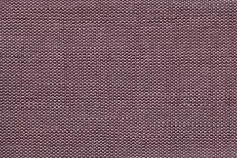 Brown textile background with checkered pattern, closeup. Fabric macro. Stock Photos