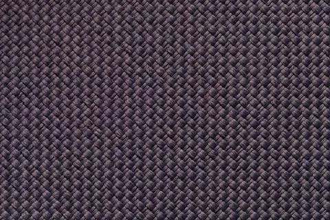 Brown textile background with checkered pattern. Structure of fabric macro. Stock Photos