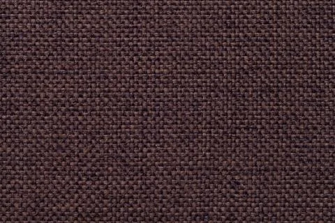 Brown textile background with checkered pattern. Structure of the fabric Stock Photos