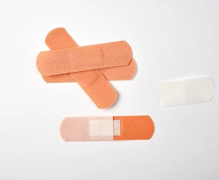 Brown textile sticky patch for wounds on the skin Stockfoto's