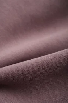 Brown textile texture. Dense premium fabric. Mocha cotton. Stock Photos