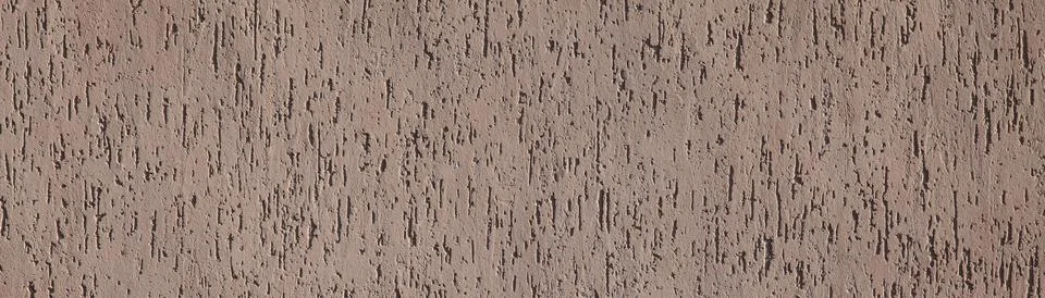 Brown texture, background. Decorated surface with vertical embossed pattern Stock Photos