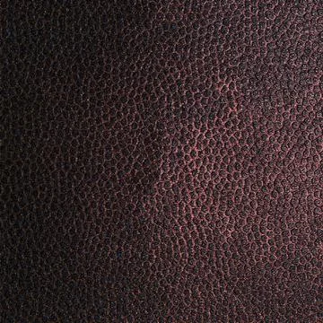 Brown texture of dense fabric with a pattern in the form of dots Stock Photos