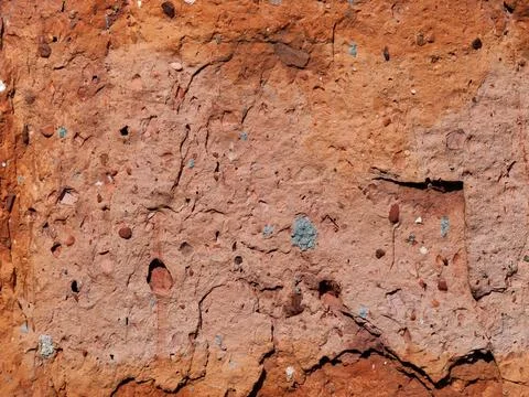 Brown texture rock wall for background. Mountain rough surface. Stone wall fo Stock Photos