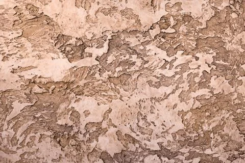 Brown textured clay with a relief pattern for interior decorating Stock Photos
