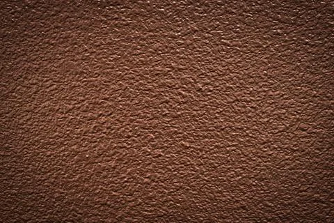 Brown textured paint pattern with vignette. Stock Photos