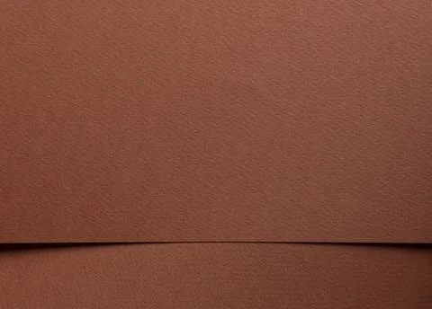Brown textured surface with a horizontal seam. Minimal abstract background wi Fotos de archivo
