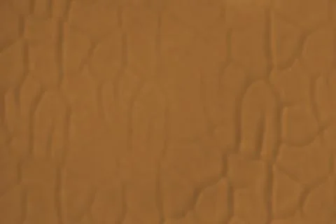 Brown Textured Wall Background with mostly vertical lines and subtle shadows 스톡 사진